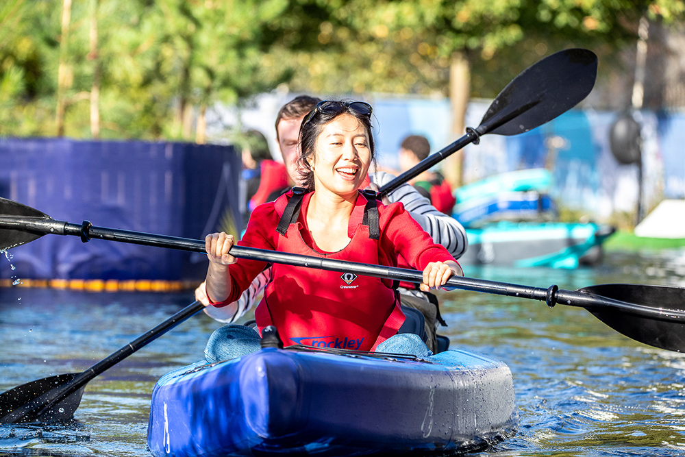 People in a Canoe on the water at SIBS.