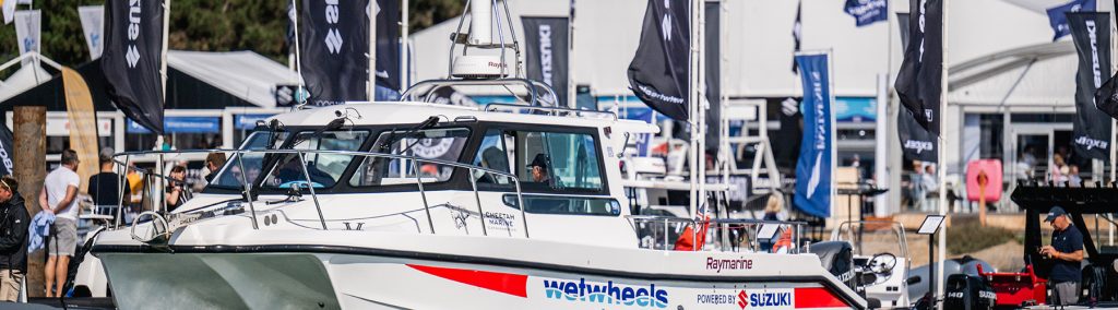 Wetwheels Solent Suzuki-powered catamaran displayed at Southampton International Boat Show marina.