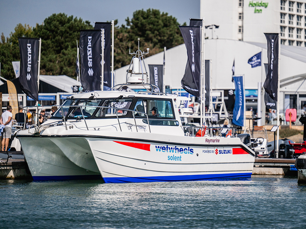 Wetwheels Solent Suzuki-powered catamaran displayed at Southampton International Boat Show marina.