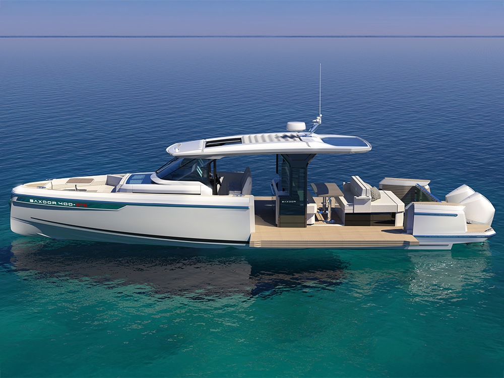 Saxdor 400 GTS open cruiser with twin outboards and terraces at rest on calm blue water.
