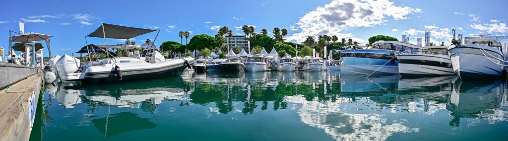Panoramic view of motorboats moored in a row at Cannes Yachting festival