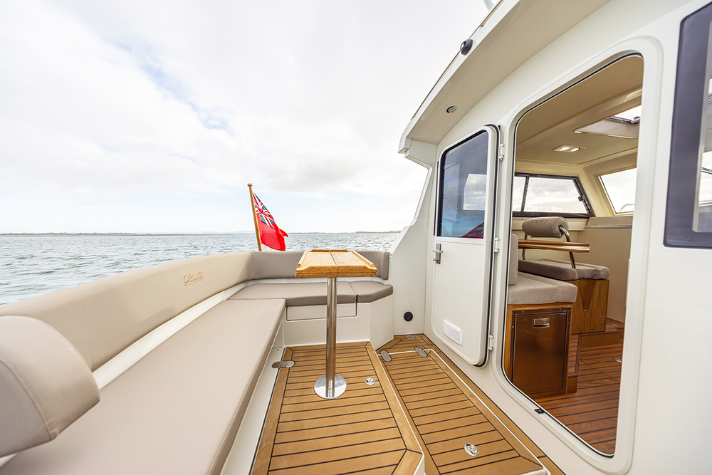 Orkney 27 aft deck view with grey upholsery seating