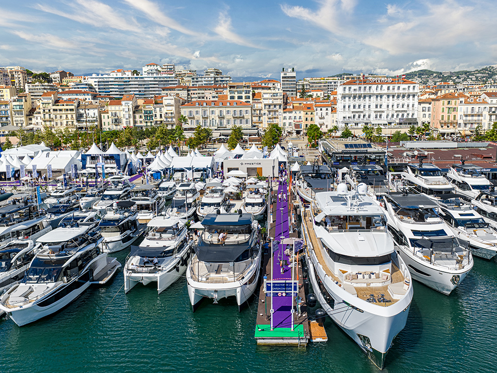 Luxury yachts line the pontoons at the Cannes Yachting Festival 2025.