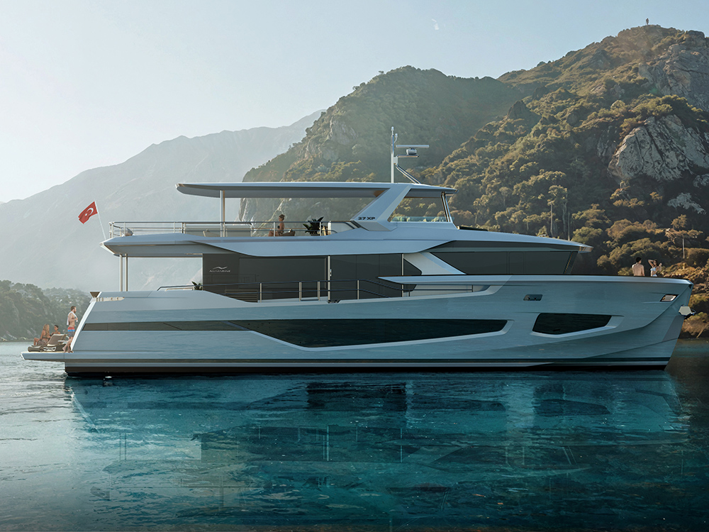 Numarine 27XP explorer yacht anchored in calm turquoise waters with guests relaxing on deck against a mountainous coastline.