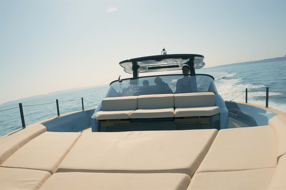 view from bow back across vessel showing sun loungers and T-Top