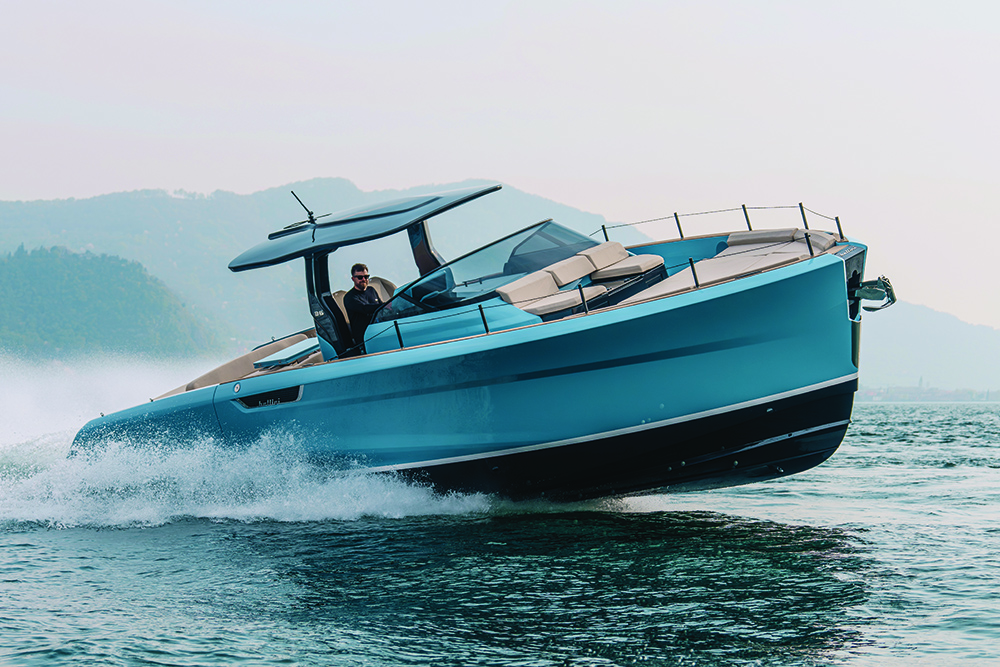 Turquoise blue motorcruiser Bellini Astor 36 underway