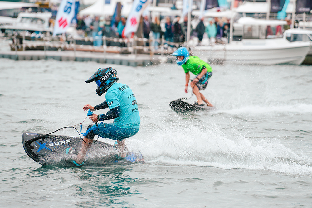 2 boarders giving wakeboarding displays at boat show