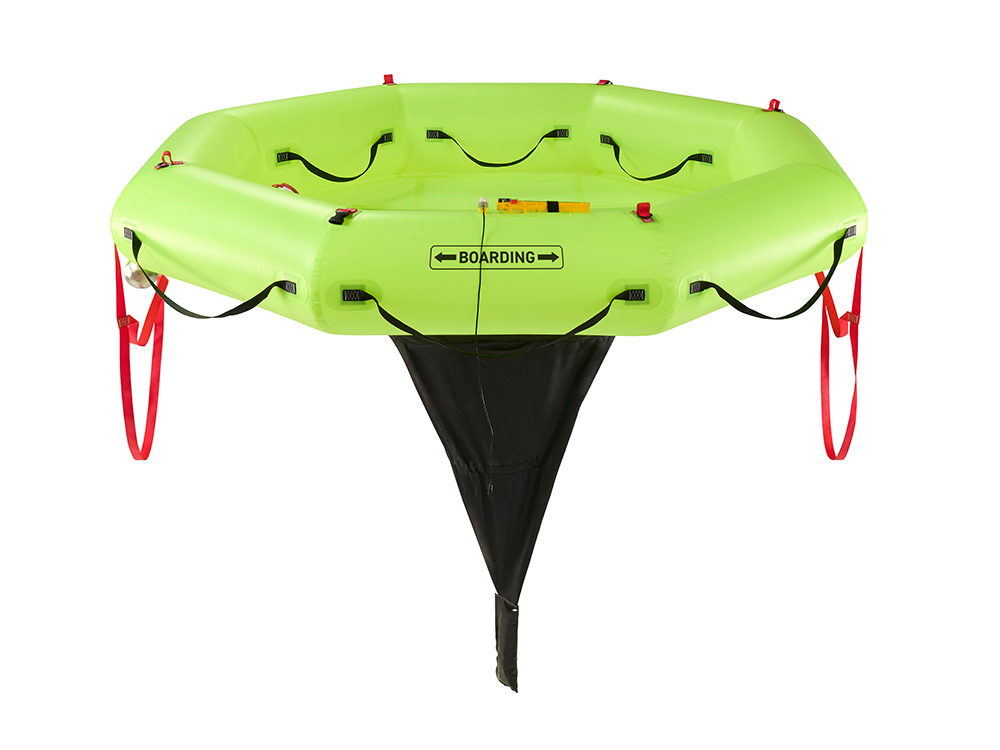 Bright green Jon Buoy EVAC inflatable platform with grab handles, boarding straps and a central drogue for stability during marine emergencies.