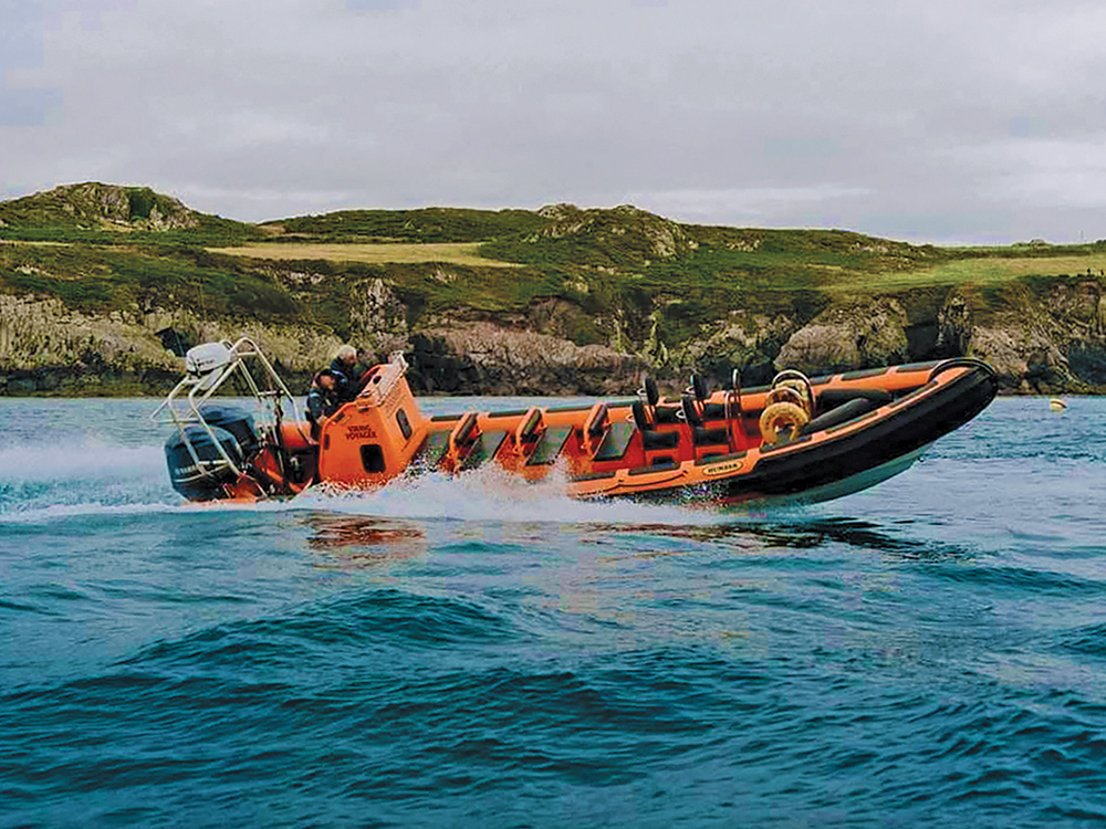 Humber RIB powering across coastal waters.