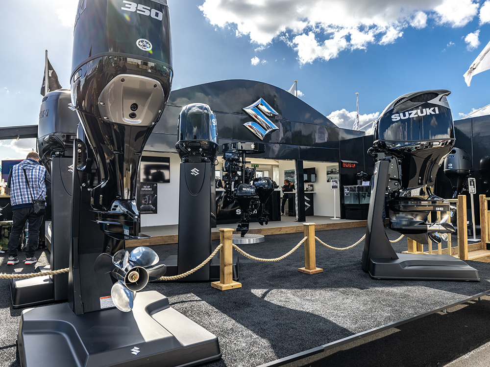 Suzuki Marine outboard motors on display at the Southampton International Boat Show, showcasing the Stealth Line.