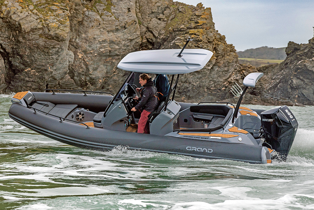 Grand GL680 at speed at sea with grey tubes