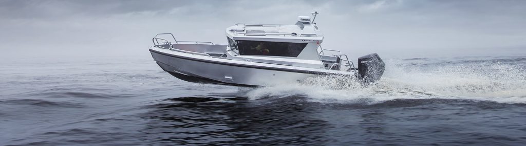 Ockelbo aluminium boat underway from right to left on a flat sea