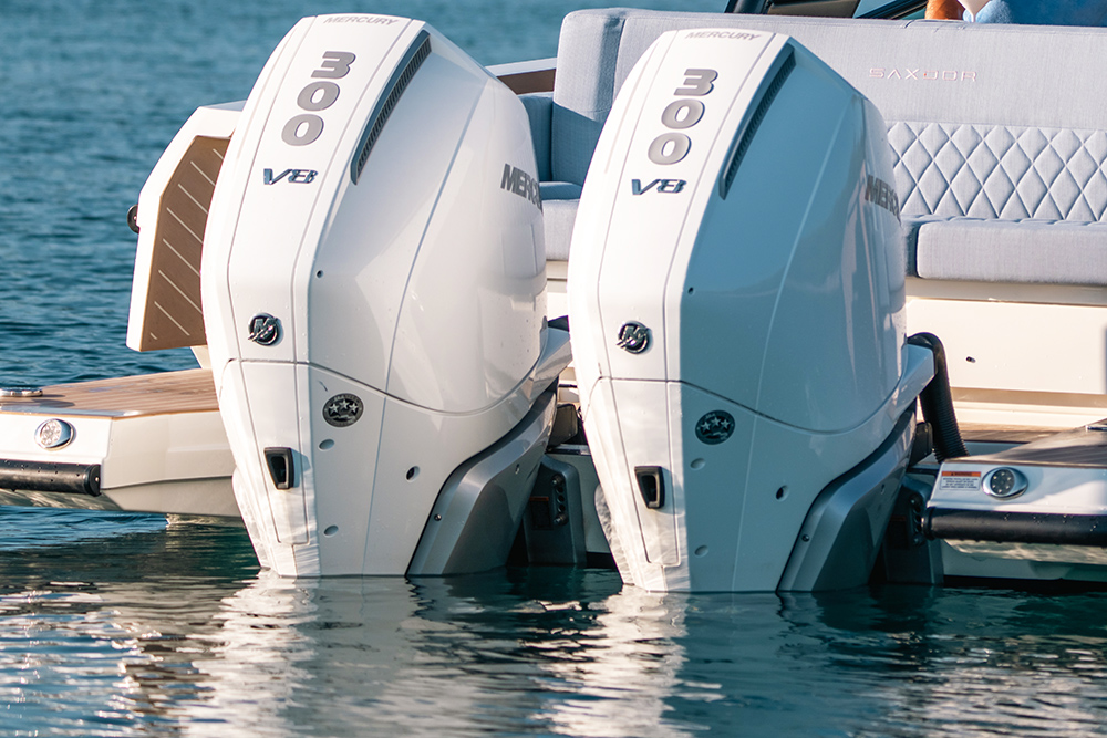 Aft view of twin Mercury 300hp outboards in white livery.