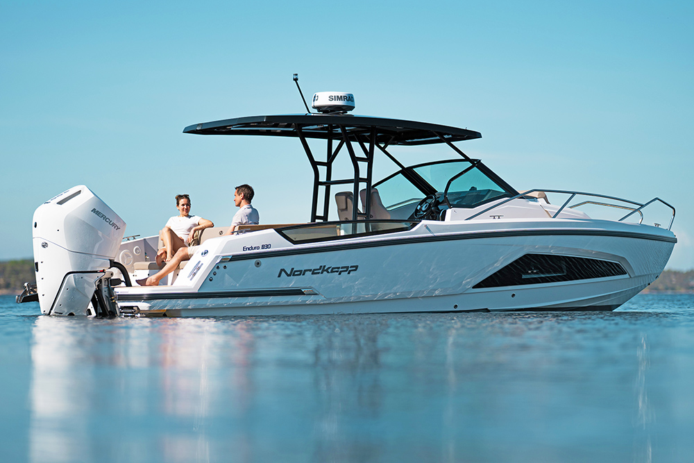 Couple sat relaxing on the aft deck of the Nordkapp Enduro 830
