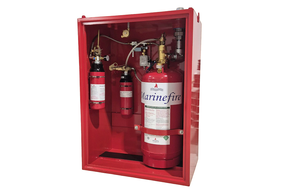 Red fire cabinet mounted on wall with Safe-Air fire products inside