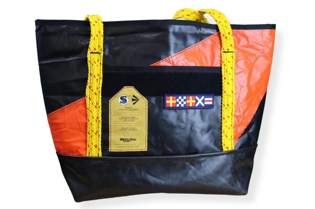 Shopping bag in recycled materials in black, orange and yellow
