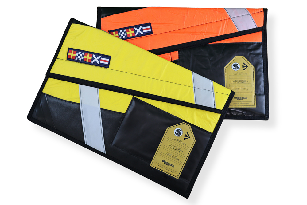 Upcycled laptop case in black, orange and yellow design