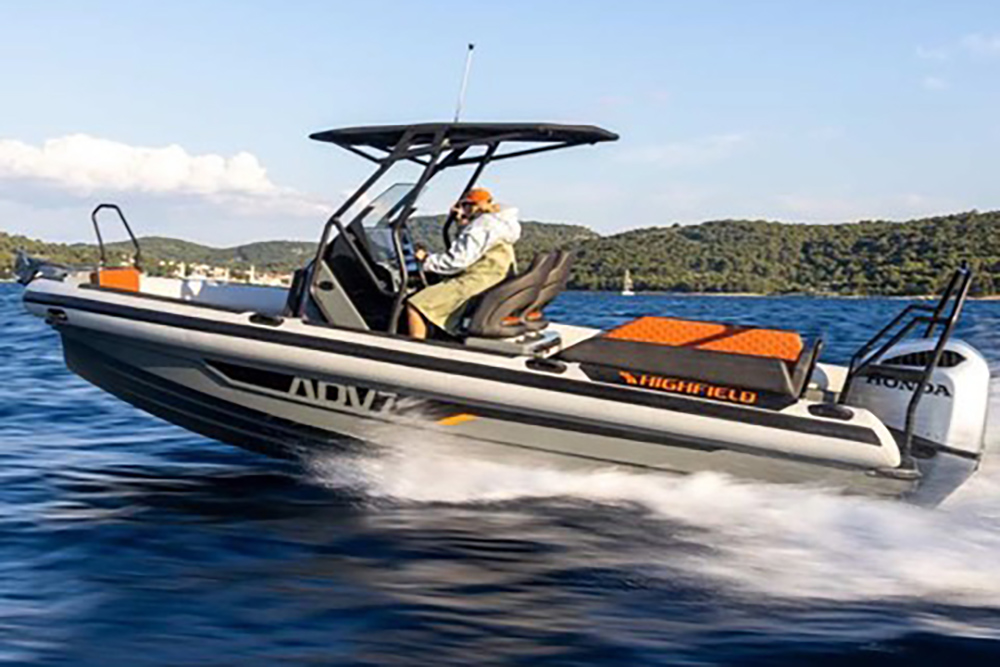 Highfield ADV7 RIB underway at speed, showing aluminium hull, centre console and more in coastal waters.