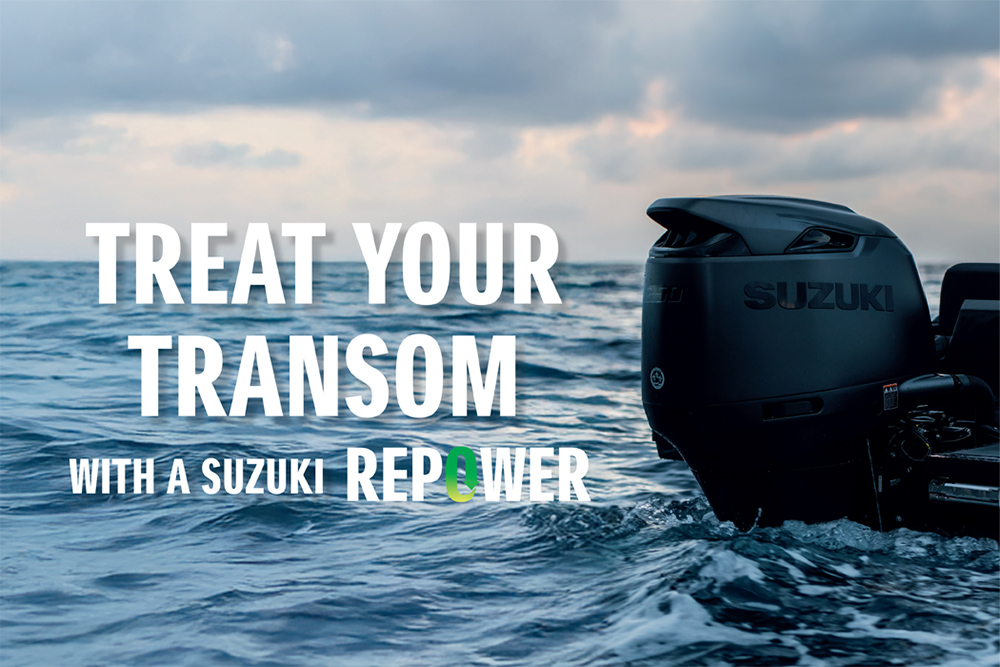 Suzuki outboard motor mounted on a boat transom at sea.
