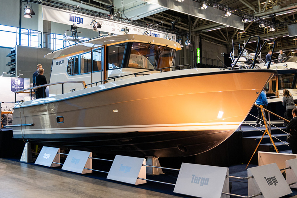 Targa 30.1 pilot house cruiser on display at Helsinki Vene Båt 2026, showcasing outboard setup and classic deck design.