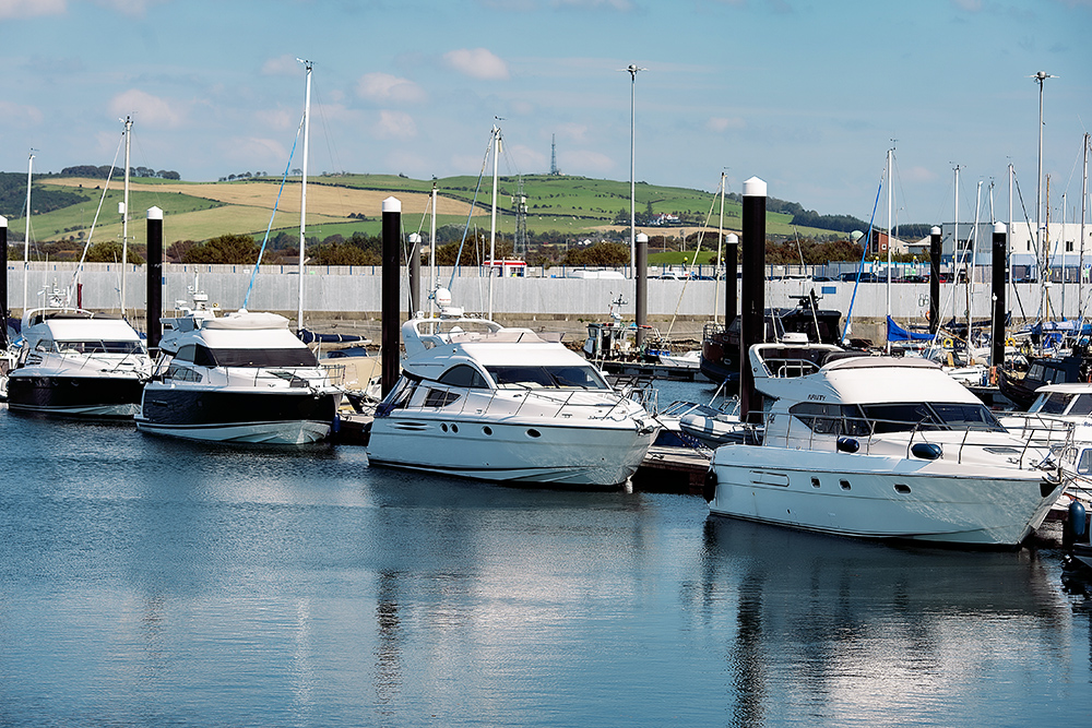Troon Yacht Haven with motorboats moored