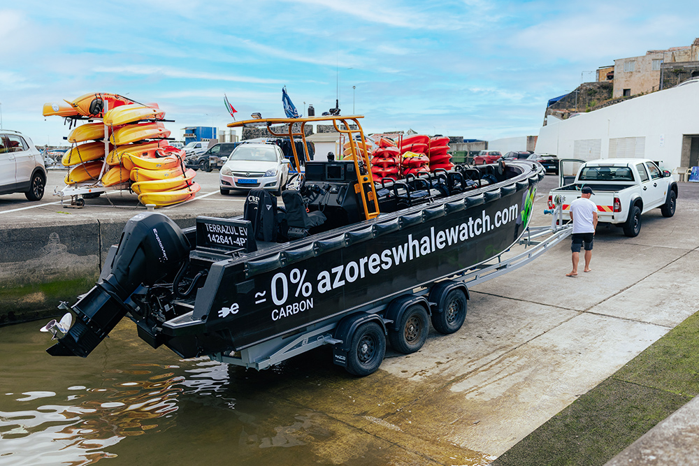 Terra Azul, 9 metre black rigid bouyancy boat on a trailer being pulled up a slipway in the Azores