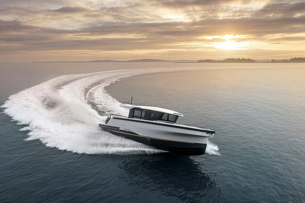 Marcopolo MP12 adventure yacht underway at speed, showing triple-step hull performance and outboard power at sunset