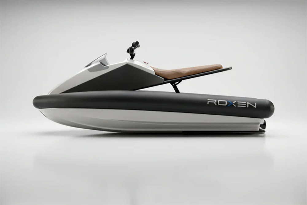 Roxen lightweight electric watercraft prototype with inflatable collar and minimalist saddle seat, shown in studio profile view.
