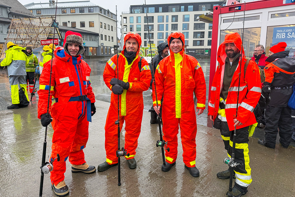 Four fishermen in Regatta red foul weather gear