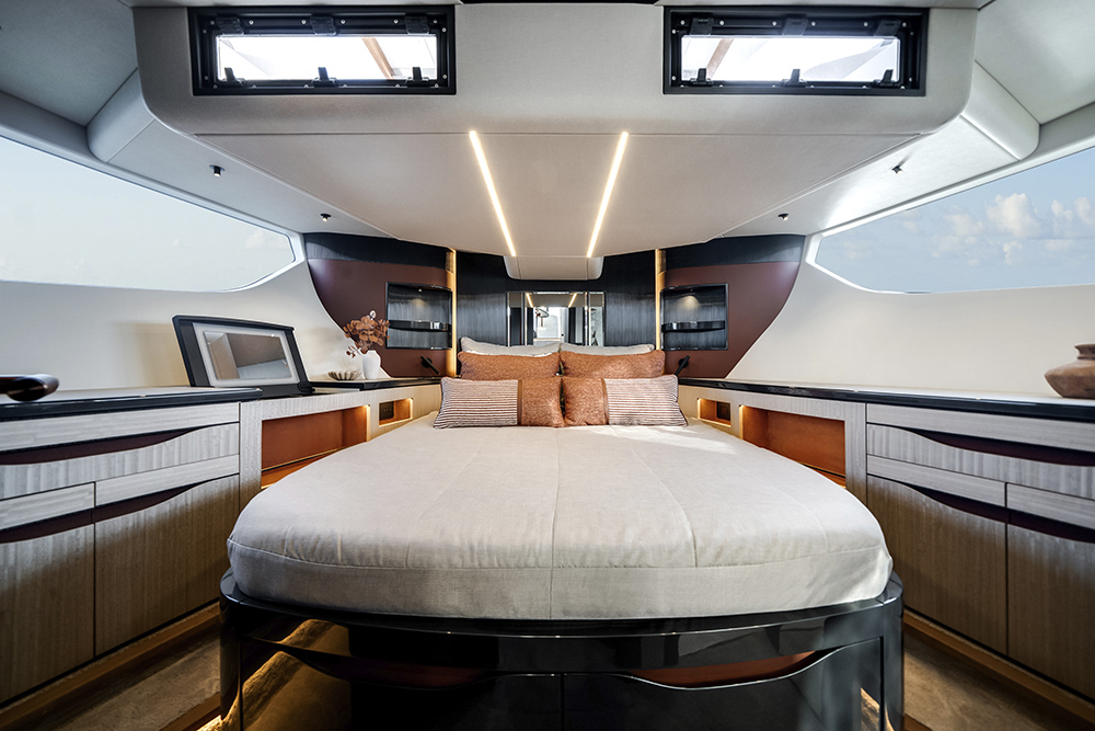 Luxury full-beam master cabin aboard the Galeon 520 FLY with panoramic glazing and contemporary yacht interior styling