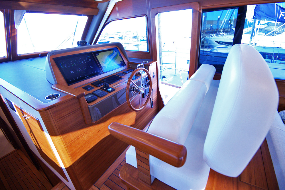 Helm station of GB54 showing bench seat and electronics