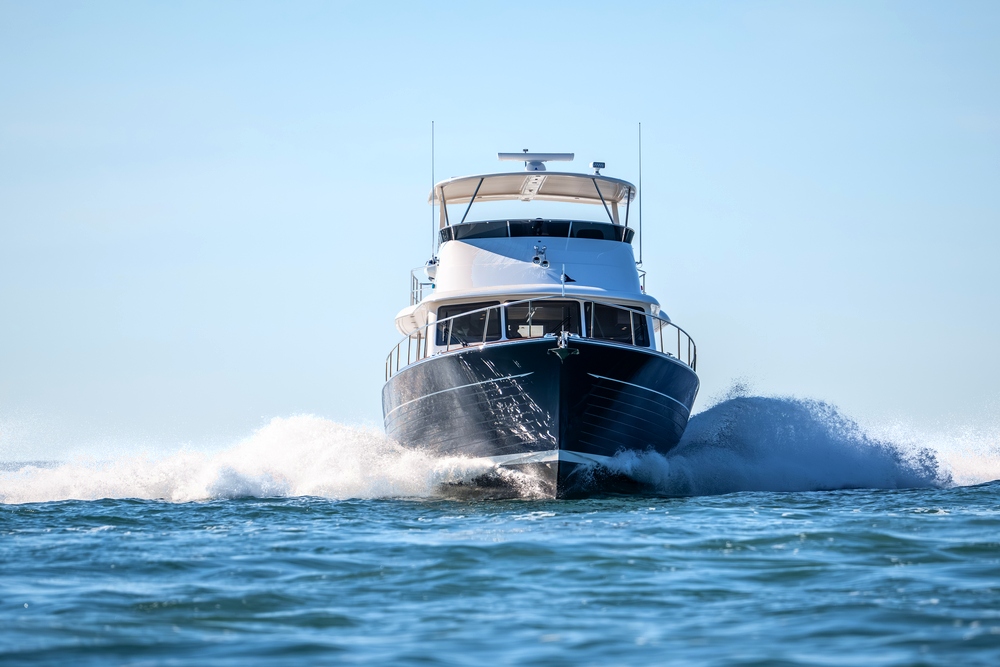 Grand Banks 54 heading straight towards you with white spray either side of the hull