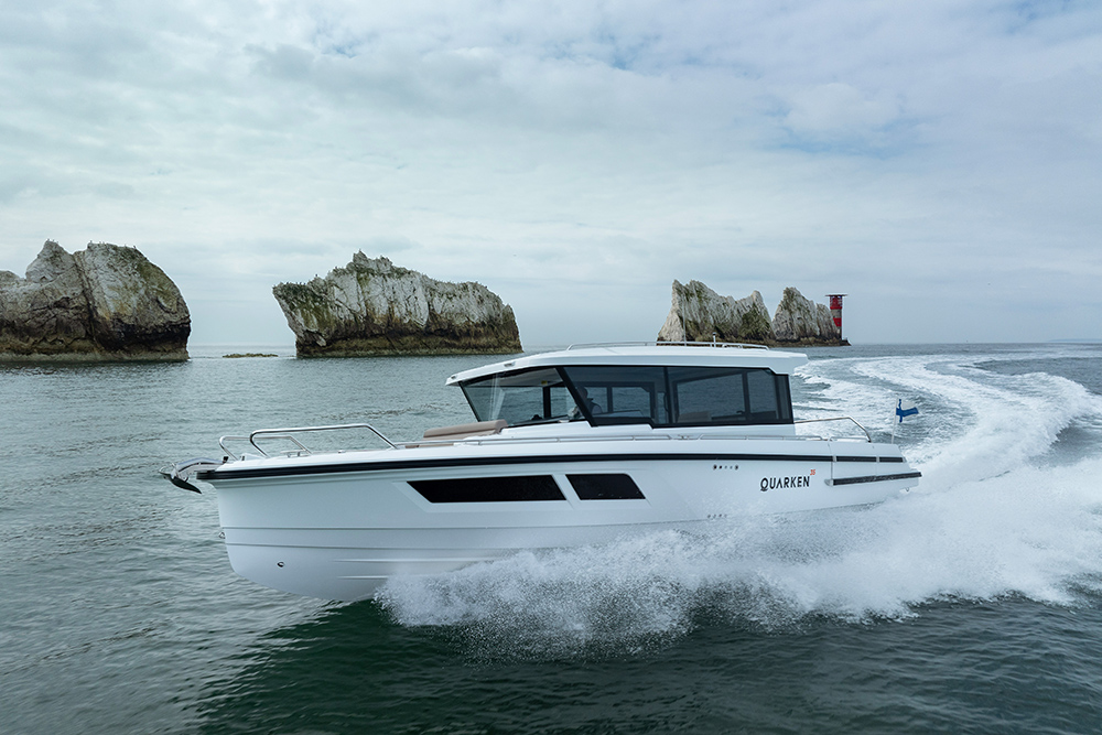Quarken cabin boat cruising off The Needles.