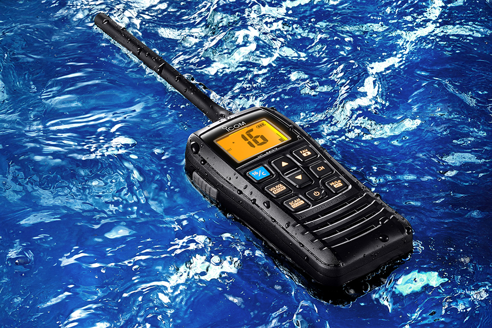 Icom VHF radio floating on sea background