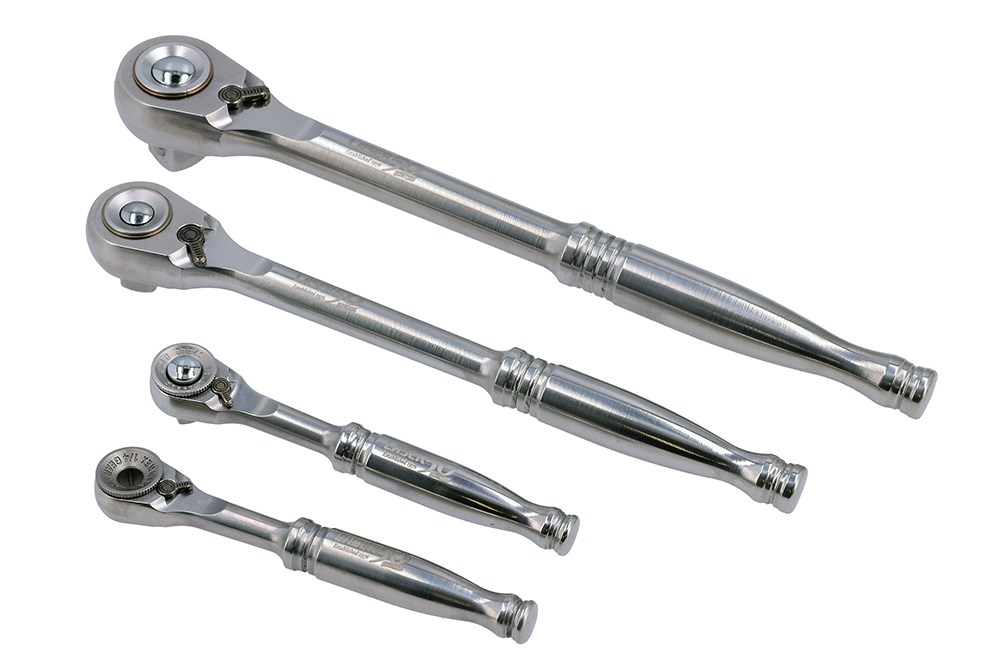 Four stainless steel Laser Tools ratchets from a professional 50th anniversary hand tool set.