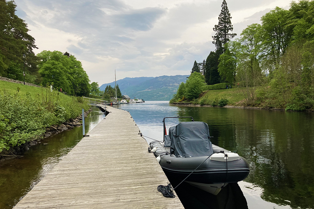 Hurricane RIB moored at Fort Augustus on the Caledonian Canal, looking towards Loch Ness