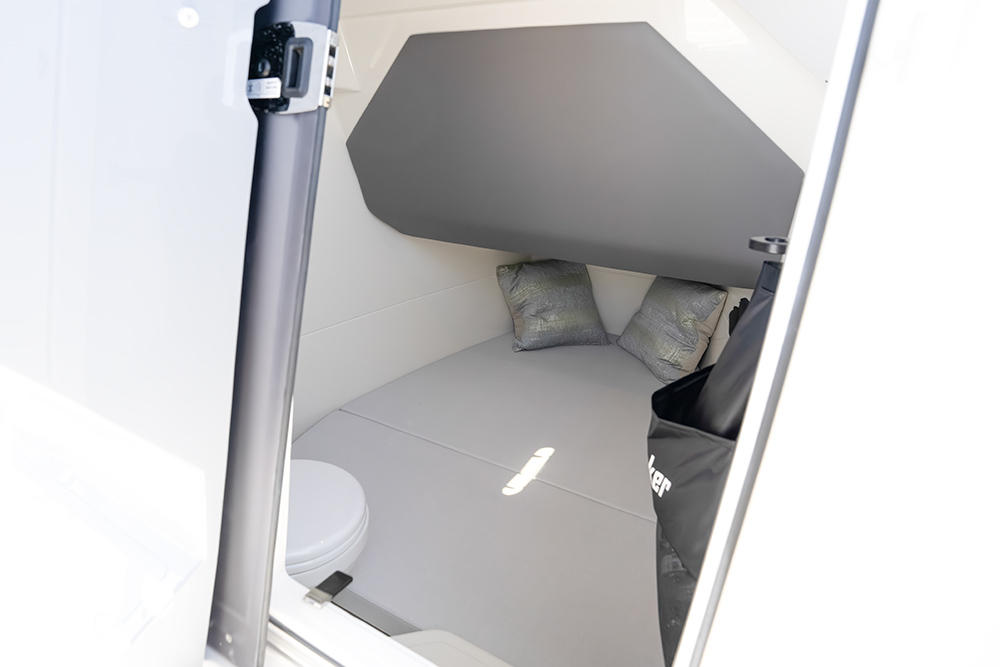 Looking through the cabin door of the Navan T30 into the small cabin with a double berth and heads.