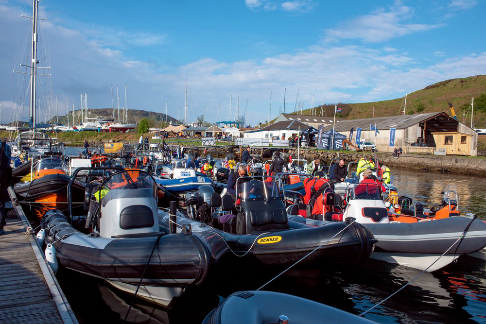 Gathering of multiple rigid inflatables made fast on pontoons