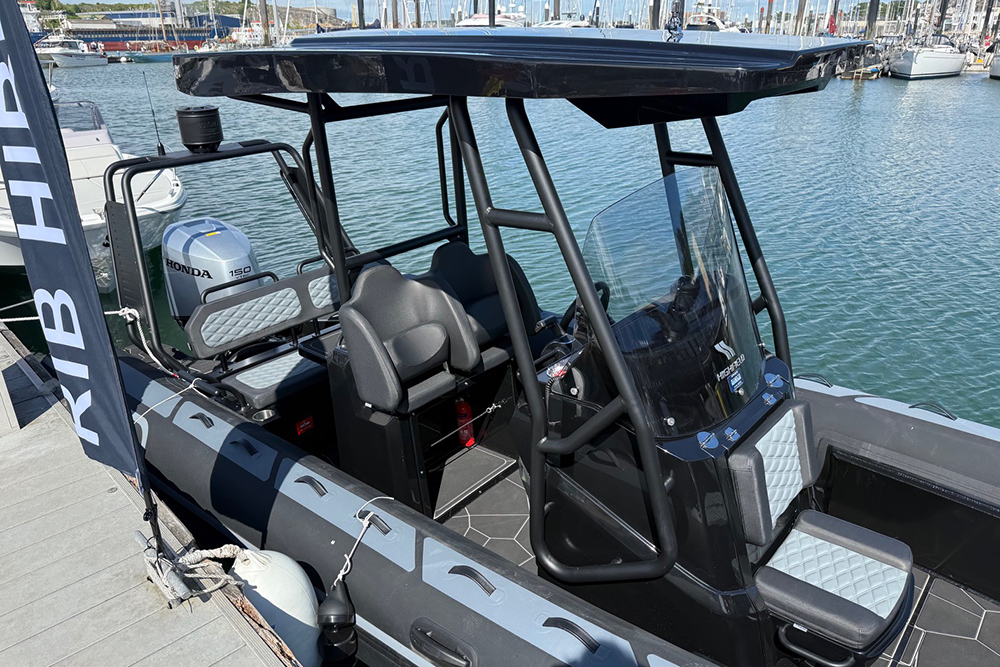 Highfield RIB with Honda outboard on display at Plymouth Boat Fest marina.