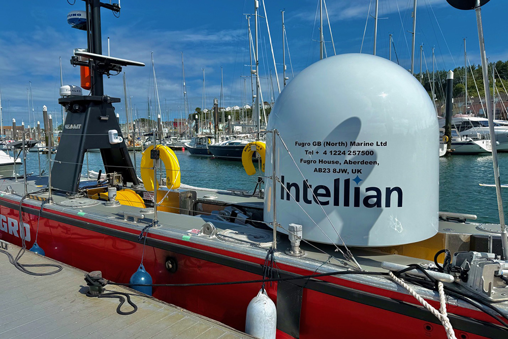 Fugro marine survey vessel on the Plymouth Boat Fest pontoons with satellite equipment visible.