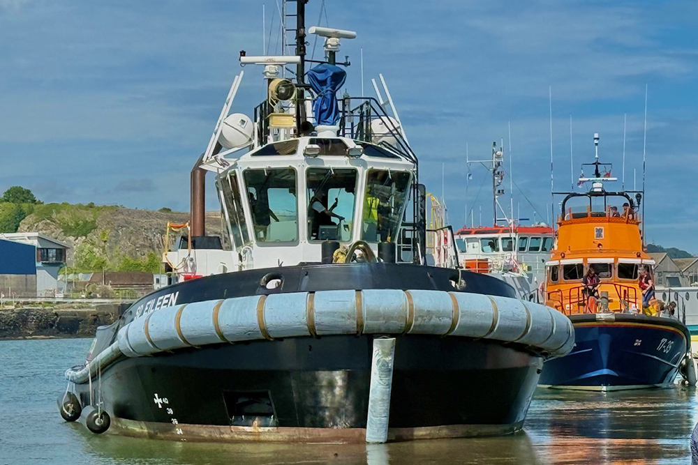 Plymouth harbour workboat and RNLI lifeboat on display at Plymouth Boat Fest.