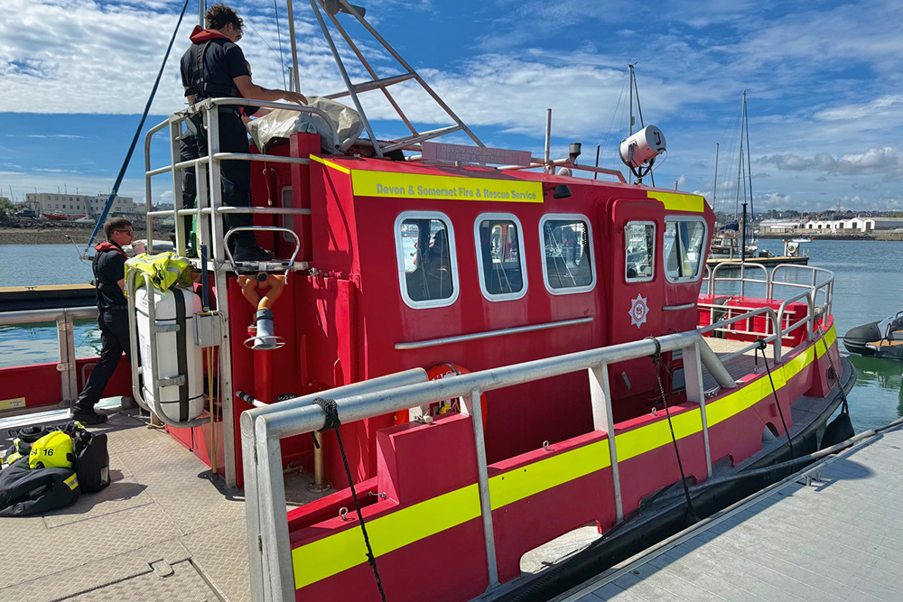 Devon and Somerset Fire and Rescue boat on display at Plymouth Boat Fest marina.