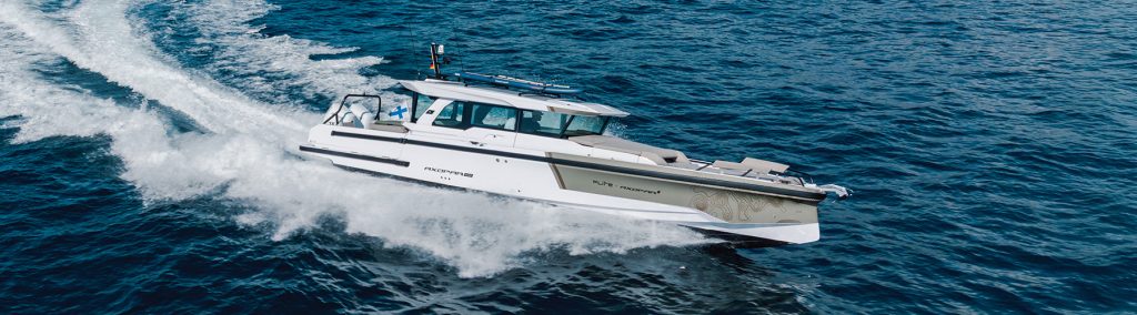 Axopar 38 XC making way at speed on a turquoise sea