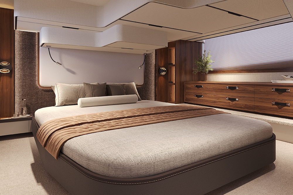 Yacht master cabin with king-size bed, walnut cabinetry and large hull window, finished in warm neutral tones.