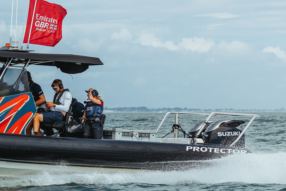 Emirates GBR chase boat powered by twin Suzuki outboards during SailGP operations on the water.