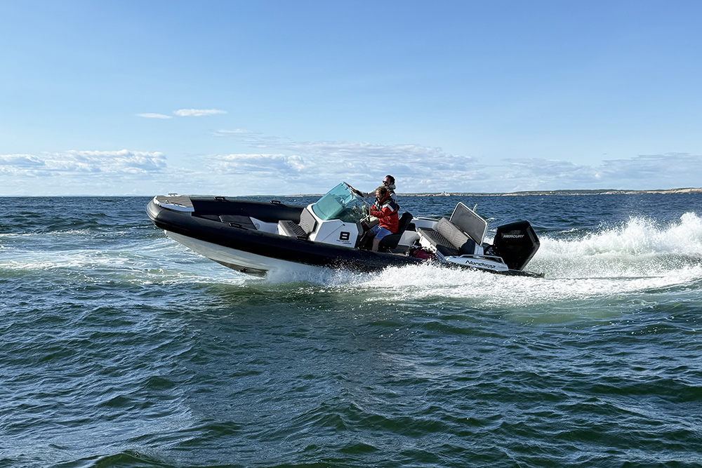 Nordkapp 8m underway at speed with white wash astern