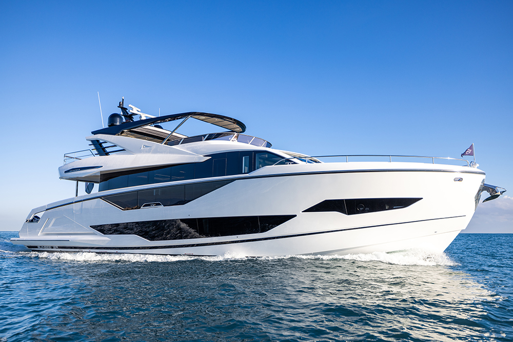 Sunseeker 90 Ocean flybridge yacht underway at speed.