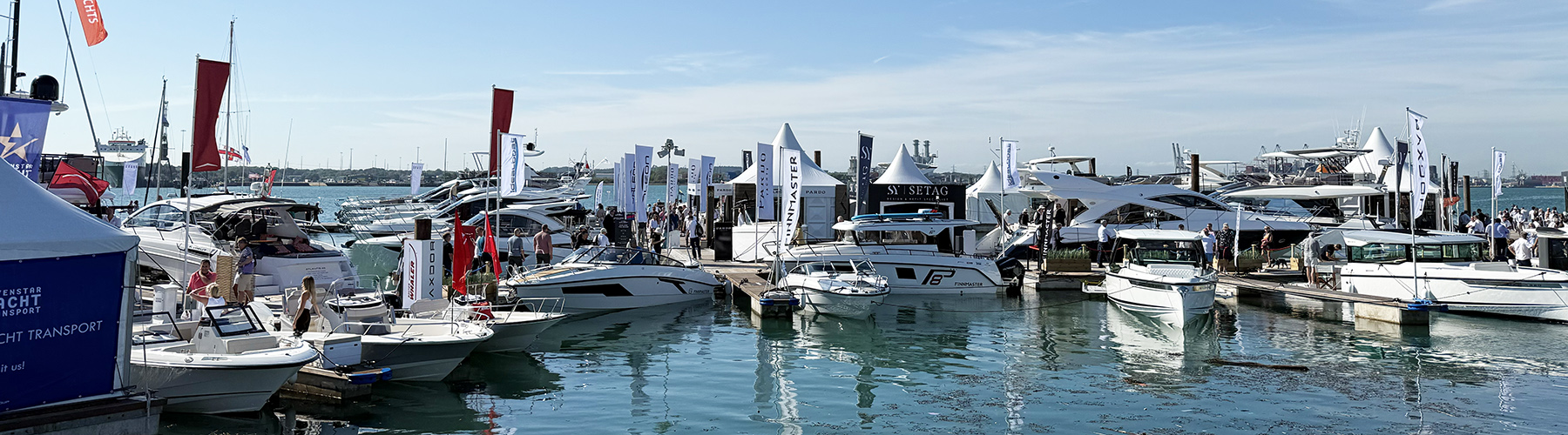 Boats moored up on the pontoons at Southampton boat show