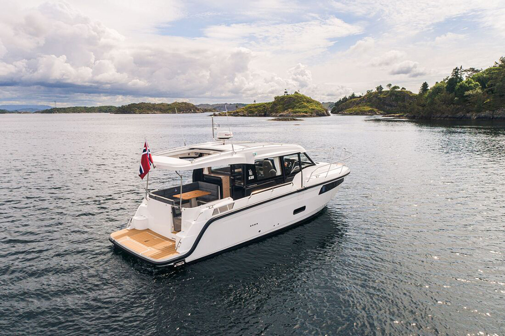 Viknes S35 Panorama motor cruiser at anchor in a sheltered coastal inlet