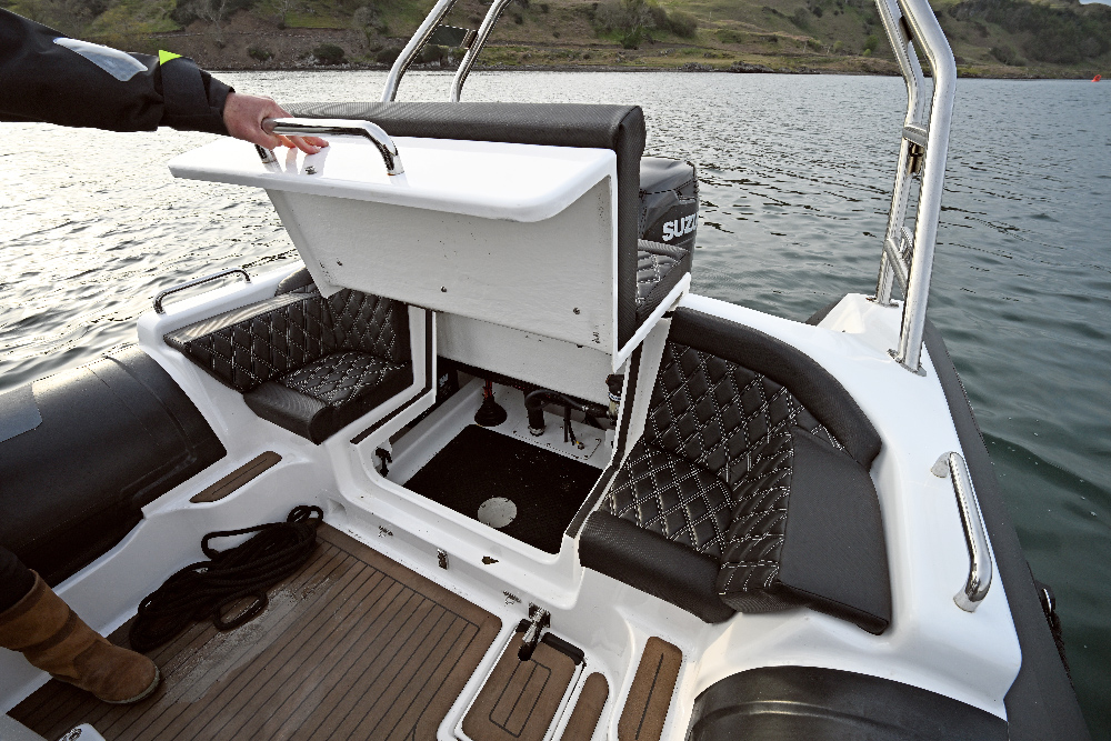 Lifted rear bench seat on the Redbay SF750 showing the under-seat storage